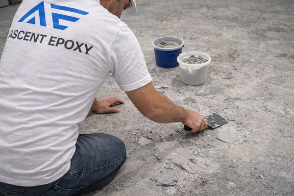 Grinding and preparing concrete after coating removal in Palm Beach County