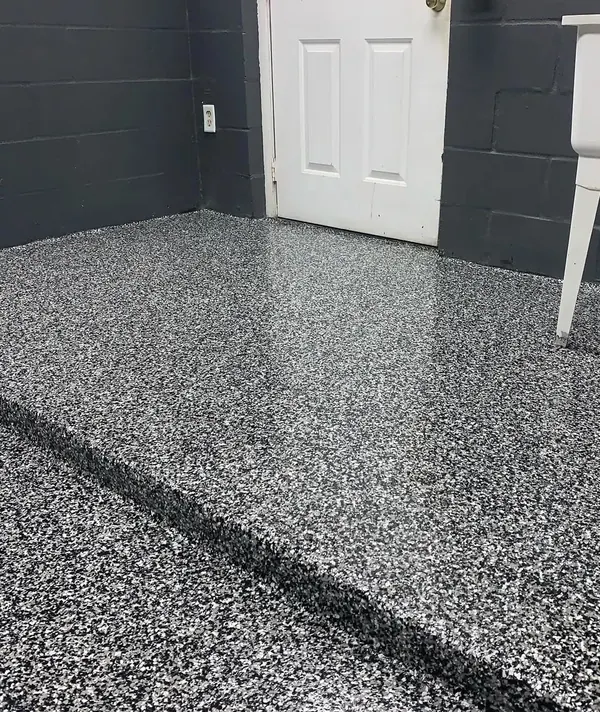 Utility room black and white flake epoxy floor