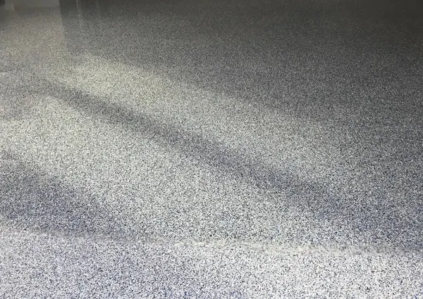 Blue-gray flake epoxy garage floor real Palm Beach County project