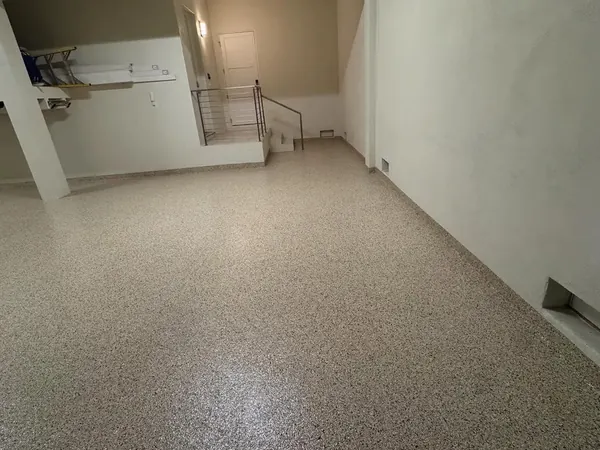 Lower-level garage tan flake epoxy floor Palm Beach County