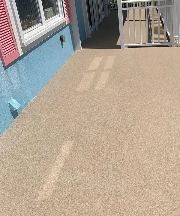 Sand-tan solid porch coating Palm Beach County